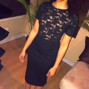 Black lace zip up dress.
